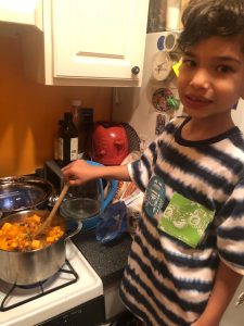 Student preparing FoodPrints Recipe at home 