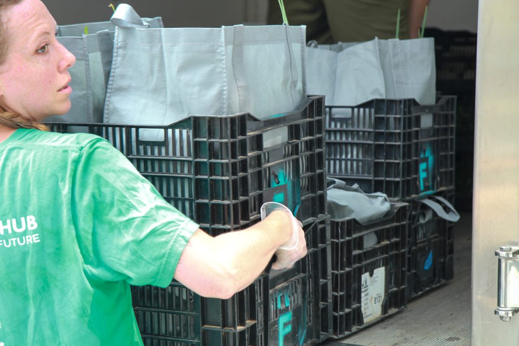 The Pop-Up Food Hub packs produce at farmers markets and delivers it to community organizations