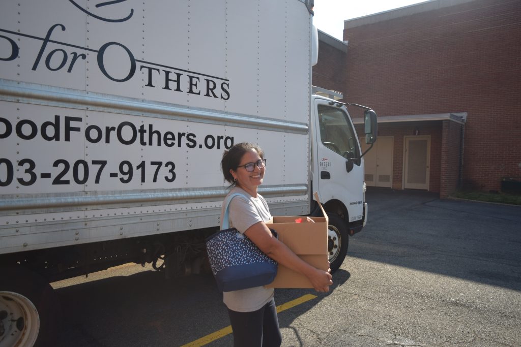 Carrying fresh produce for Food for Others