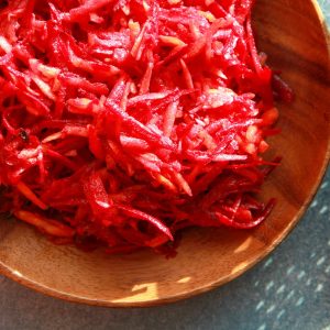 ABC Salad of grated apples, beets, and carrots combined with a tangy dressing. 